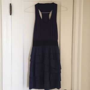 BCBG navy dress with racerback and ruffled skirt